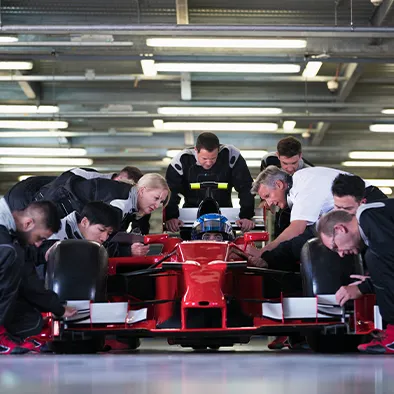 An elite team fixing a formula 1 car